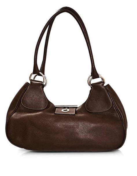 brown leather prada overnight bag|Prada buckle bag.